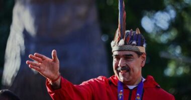 President Nicolás Maduro of Venezuela greets his supporters during a rally to commemorate Indigenous Resistance Day on October 12, 2025 in Caracas, Venezuela.