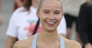 WAG Annalise Dalins flaunts her figure at Bondi Beach