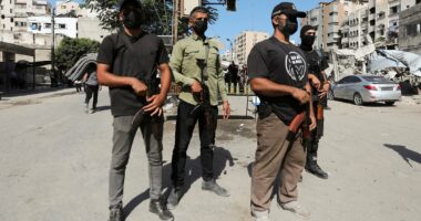 Hamas vows to 'cleanse Gaza of outlaws and collaborators with Israel' as its gunmen take back control of the enclave