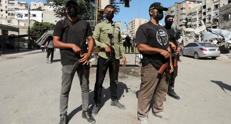 Hamas vows to 'cleanse Gaza of outlaws and collaborators with Israel' as its gunmen take back control of the enclave