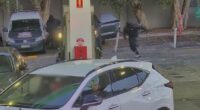 Police tell rapper to 'come face the music' after man shot dead at service station