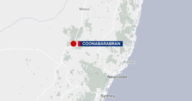 Two people to face court after man set on fire on regional NSW street