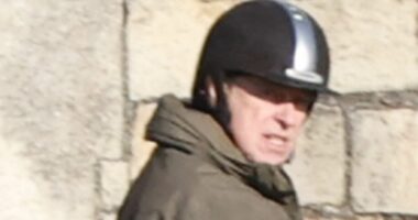 A prince no more: Andrew rides around Windsor in first appearance since being stripped of titles and kicked out of Royal Lodge