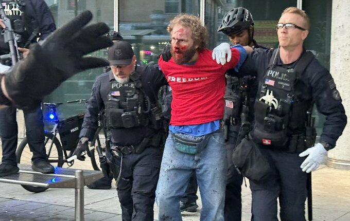 Arrests made as protesters clash with police at Turning Point event at UC Berkeley