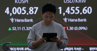 Asian shares advance as tech shares rebound from AI jitters