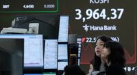 Asian shares are mixed in holiday-thinned trading with Wall Street closed for Thanksgiving