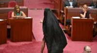 Australian senator wears burqa after move to block her face-covering ban bill