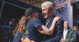 Bill Clinton spotted at NYC Marathon with bandaged nose while cheering on daughter Chelsea
