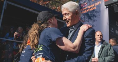 Bill Clinton spotted at NYC Marathon with bandaged nose while cheering on daughter Chelsea