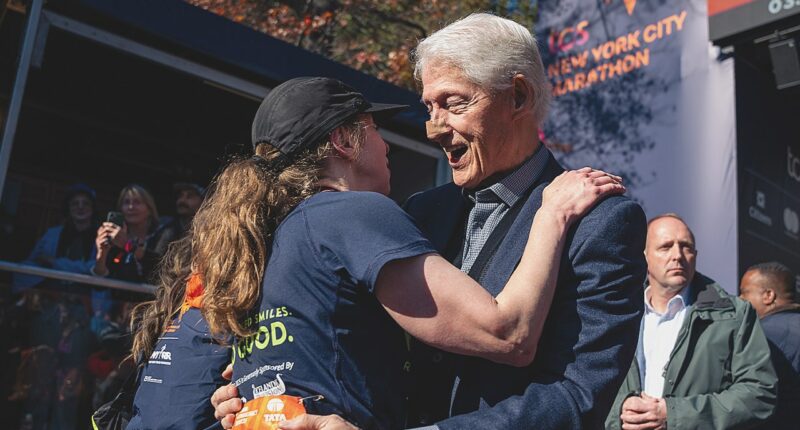 Bill Clinton spotted at NYC Marathon with bandaged nose while cheering on daughter Chelsea
