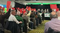 Celtic's annual general meeting ABANDONED after angry fans jeer board and wave red cards at top table