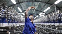 China factory activity edges up in November but remains in contraction