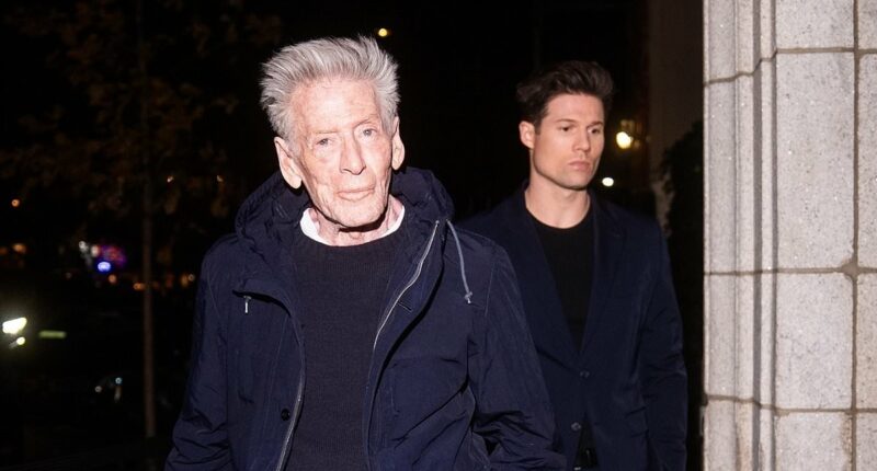 Confused Calvin Klein, 83, stumbles in front of younger boyfriend