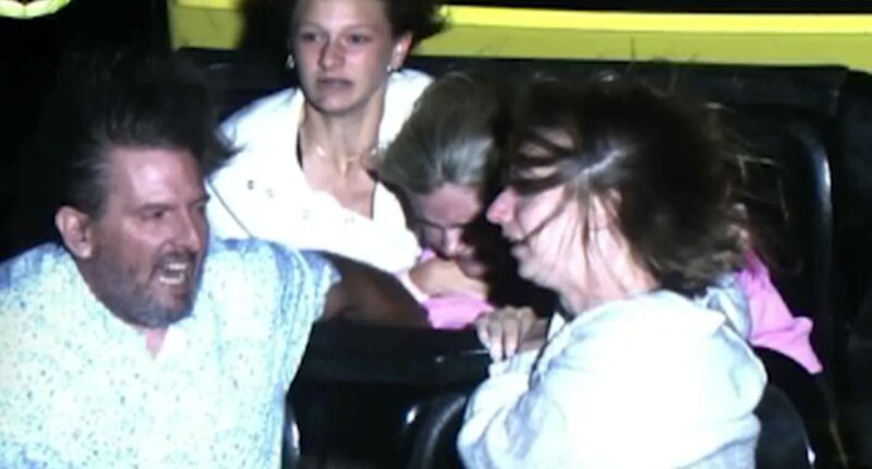 Couple help secure girls on roller coaster after alleged seat belt malfunction at Worlds of Fun in Kansas City, Missouri