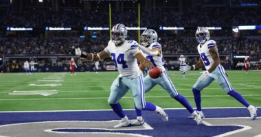 Dallas Cowboys defensive end Marshawn Kneeland (94) celebrates after he recovered a blocked punt for a touchdown in the first half of an NFL football game against the Arizona Cardinals first half of an NFL football game Monday, Nov. 3, 2025, in Arlington, Texas. (AP Photo/Richard Rodriguez)