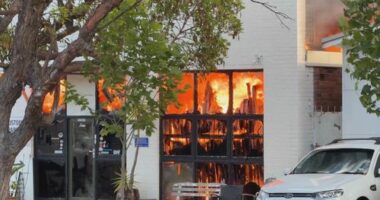 The blaze broke out less than an hour ago in Brookvale and is still burning out of control.