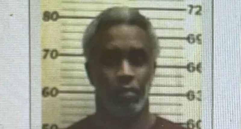 Diddy seen in first prison mugshot... and has now gone completely gray