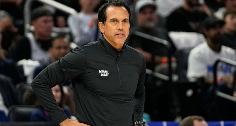 Distraught Miami Heat coach Erik Spoelstra watches on helplessly as his home burns to the ground in huge overnight fire