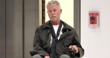 Frail Eric Dane maneuvers wheelchair through LAX amid ALS battle