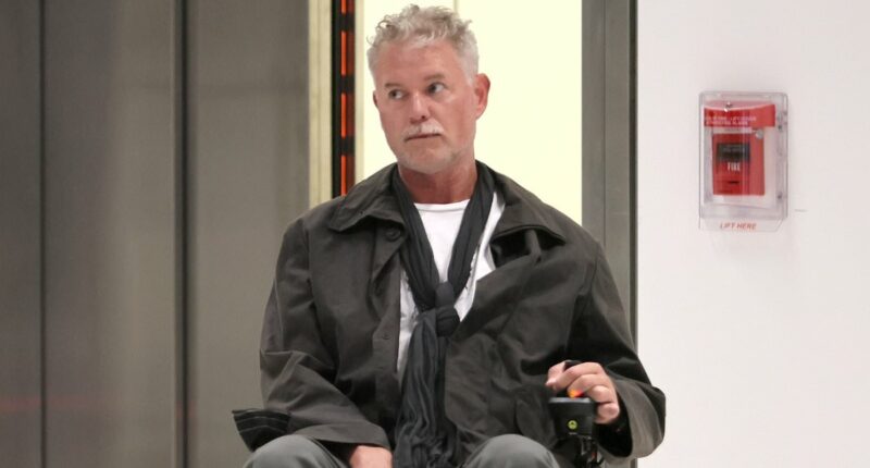 Frail Eric Dane maneuvers wheelchair through LAX amid ALS battle