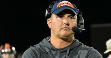 Fugitive football coach Travis Turner 'left home with a firearm'