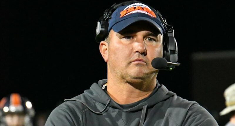 Fugitive football coach Travis Turner 'left home with a firearm'