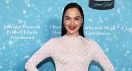 Gal Gadot looks sensational in a figure-hugging sequinned gown as she attends Beverly Hills charity bash - while tensions with Snow White co-star Rachel Zegler rumble on