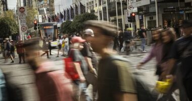 Pedestrians on Bourke Street in Melbourne.