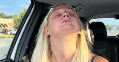 Influencer with Tourette's Syndrome sparks debate after posting driving video which shows her closing her eyes behind the wheel due to tics