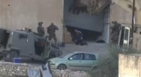Israeli troops are accused of executing two 'surrendering' Palestinian men as IDF 'reviews' horrific footage