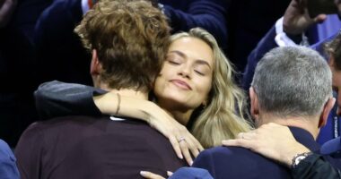 Jannik Sinner celebrates with model girlfriend as dominant Italian beats Carlos Alcaraz in ATP Finals - before addressing engagement rumours