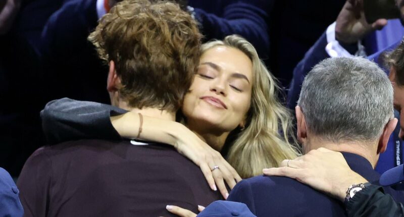 Jannik Sinner celebrates with model girlfriend as dominant Italian beats Carlos Alcaraz in ATP Finals - before addressing engagement rumours
