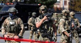 Judge dismisses charges against 2 people accused of ramming vehicle of federal agents conducting Chicago immigration sweeps