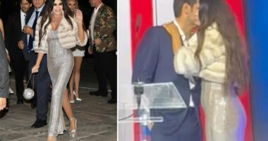 Kimberly Guilfoyle stuns in high slit gown at intimate debut ambassador party - featuring a VERY pricey clutch
