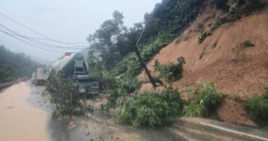Landslide strikes bus on mountain pass in Vietnam, killing 6, as heavy rain persists