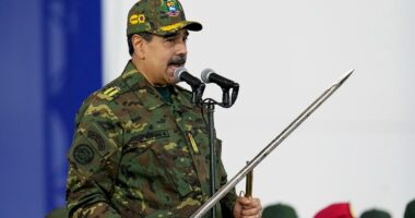 Maduro brandishes sword at rally as he rails against 'imperialist aggression' amid rising tensions with US