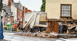 Man dies and two others injured after bin lorry crashes into house