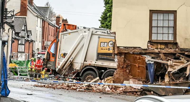 Man dies and two others injured after bin lorry crashes into house