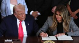 Melania signs executive order alongside Trump