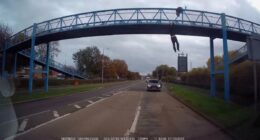 Moment hero musician helps save the life of man hanging off bridge