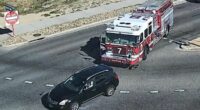 Moment reckless driver, 20, cuts off fire truck and crashes into it