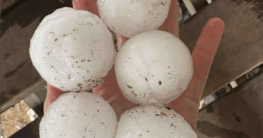 A massive supercell thunderstorm has hammered parts of Queensland, unleashing giant hail, fierce winds and lightning