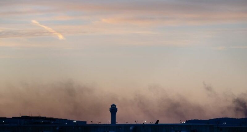 Officials scour charred site of UPS plane crash for victims and answers