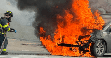 Ohio school van catches fire with people trapped inside