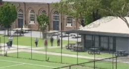 Police surrounding a student armed with a knife at North Sydney Boys High.
