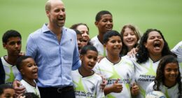 Prince William plays football with local children n Rio de Janeiro