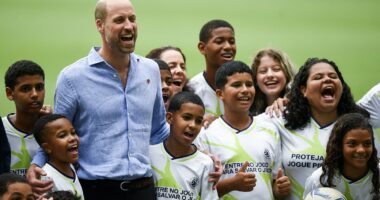 Prince William plays football with local children n Rio de Janeiro