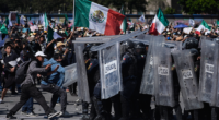 Protesters attack police, breach barrier at Mexico's National Palace during rally against cartel violence