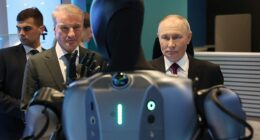 Putin calls dancing Russian robot 'very beautiful' in awkward AI conference moment