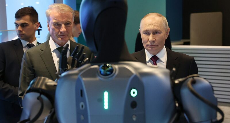 Putin calls dancing Russian robot 'very beautiful' in awkward AI conference moment